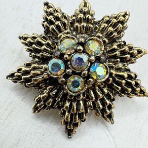 Starburst Mid century Aurora Borealis Gold tone pin Poinsettia Flower Brooch